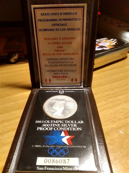 nomisma 1983 USA OLYMPIC DOLLAR 900 FINE SILVER PROOF CONDITION