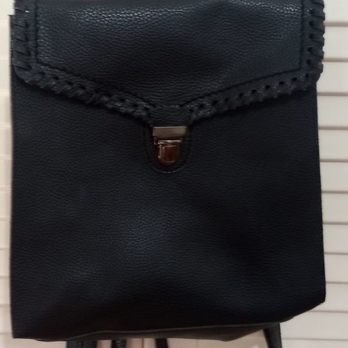 Black synthetic backpack bag used