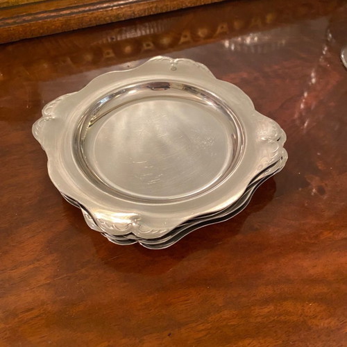 Set of 5 metal small plates and 6 matching stainless steel bowls used