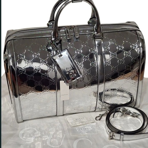Gucci leather travel bag new, limited edition, silver