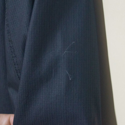 Brown jacket used, size L, with small scratch