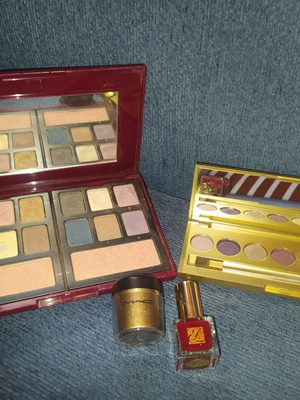 Elizabeth Arden and Estee Lauder eyeshadow and blush palettes with Mac powder and Estee Lauder manicure used