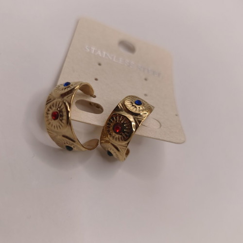 Wide stainless steel hoop earrings with embossed suns and colored crystals