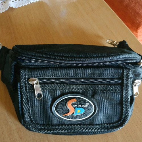 Men's waist bag like new, missing cord