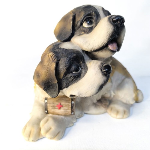 Decorative resin figurine of two puppies used