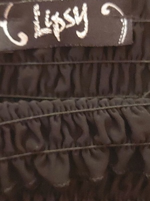 Lipsy women's long blouse small used, multicolor and black