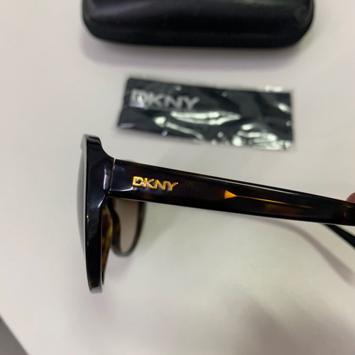 DKNY sunglasses like new, tortoise shell