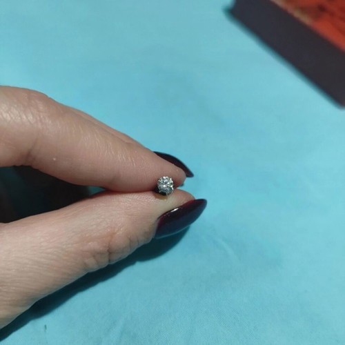 Silver earring new with rhinestones