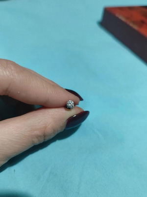 Silver earring new with rhinestones