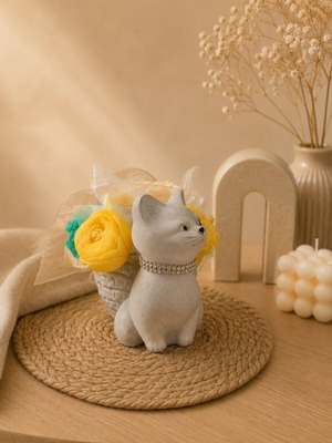 Porcelain cat with scented wax flowers