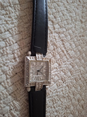 Vintage steel women's watch with new leather strap used