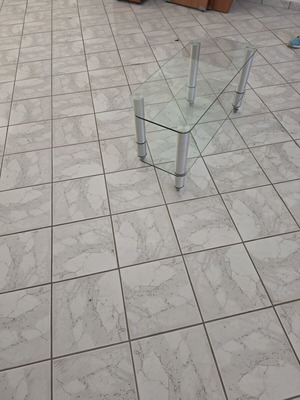 Glass TV table with wheels