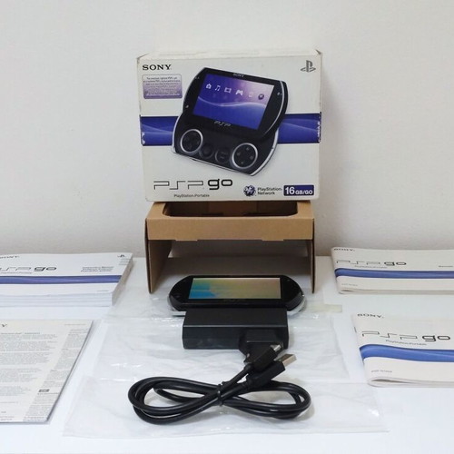 PSP GO console like new with original cables and 4GB memory card