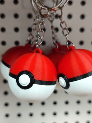 Pokeball keychain like new, black and red