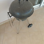 Grill with tongs used