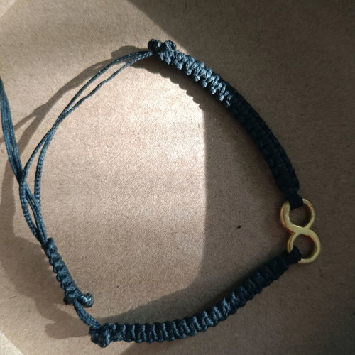 Bracelet used, leather cord with infinity symbol, black