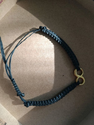 Bracelet used, leather cord with infinity symbol, black