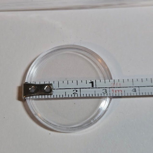 Plastic coin capsules 27 mm new, pack of 100 with storage box
