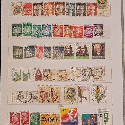 Stamp album used with 10 pages of foreign stamps 1960-1990
