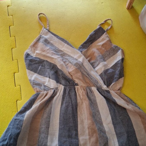 Linen sleeveless top used with earth-tone stripes, size M