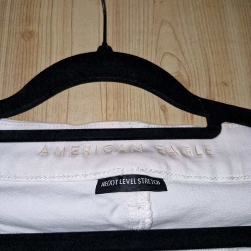 American Eagle white jeans like new, size L with asymmetric hem
