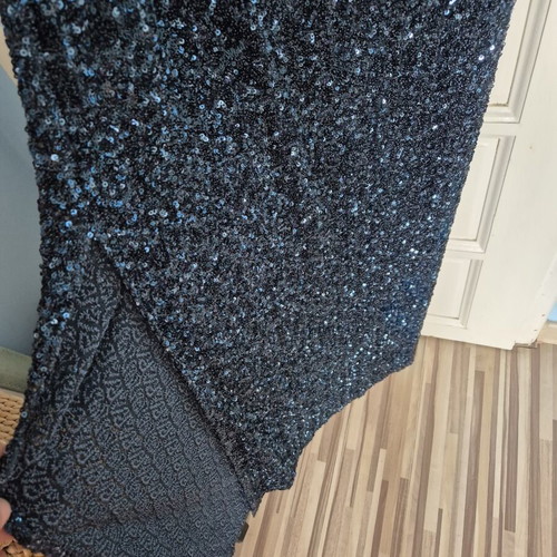 Official dresses in blue-green and black-gold XL, others S
