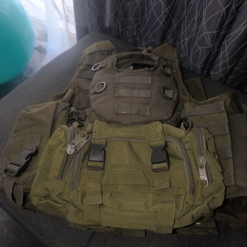 Tactical Vest used with first aid kit and magazine pouches