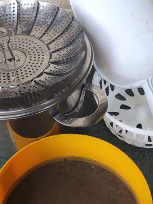 Cookware set used with pot, steamer, sieve, and colander