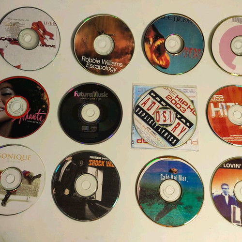 12 music CDs non-original, like new pack