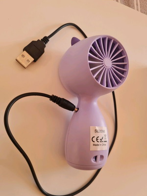 Portable handheld fan like new with USB, one speed