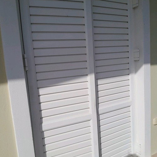 Balcony door like new 225×130 with glass and shutters