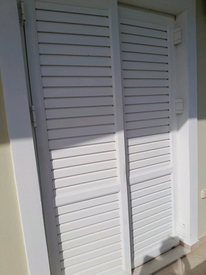 Balcony door like new 225×130 with glass and shutters