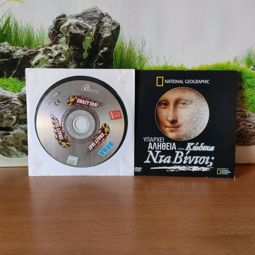 Crazy Taxi CD and National Geographic DVD The Truth in the Da Vinci Code like new