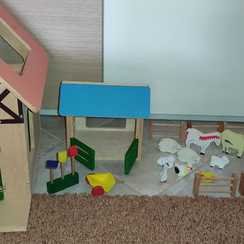 Large wooden Plan Toys animal farm with ELC figures used