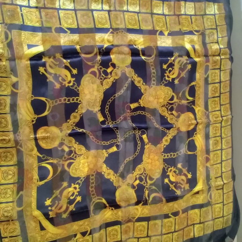 Women's semi-transparent scarf like new, blue with gold designs