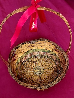 Wicker Easter basket used with red ribbon