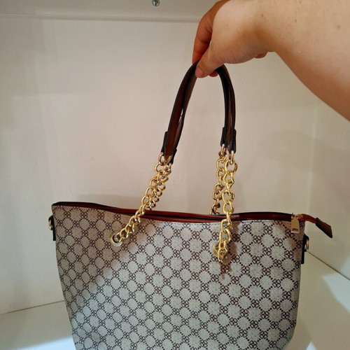 Classic women's shoulder bag with chains used, multicolor