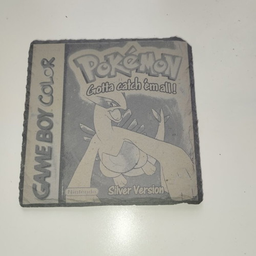 Pokemon slate coaster with Black 2 cover art
