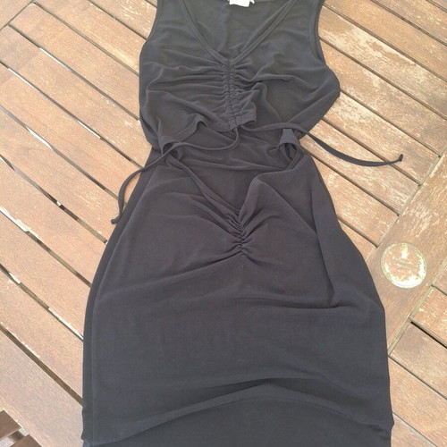 Black tight short dress with belly cutout like new