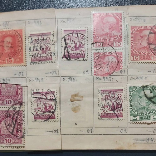 Stamp album used with Austrian stamps, all sealed with hinges