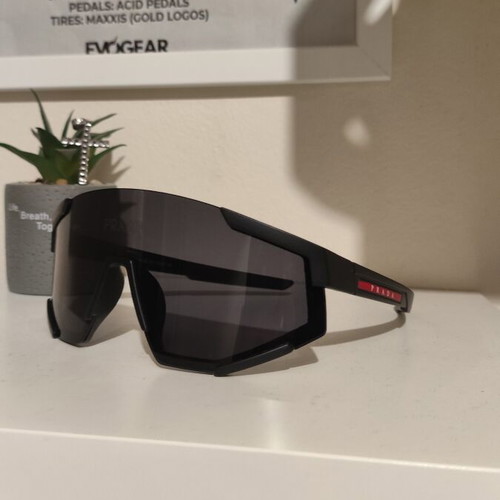 Prada sunglasses with case, new, black