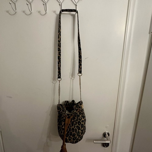 Juicy Couture crossbody bag used with leopard pouch