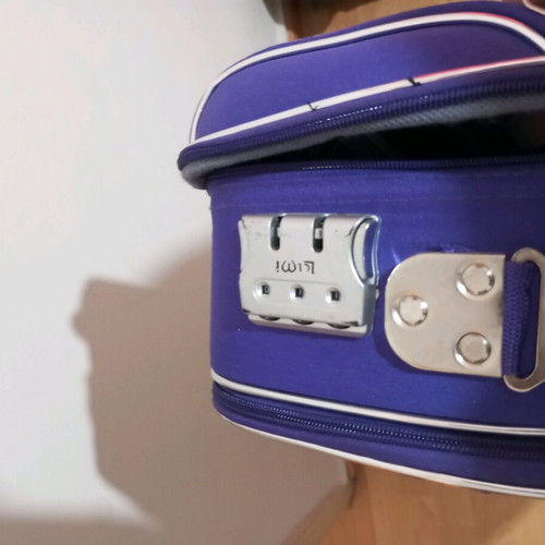 Small travel suitcase purple like new with many compartments