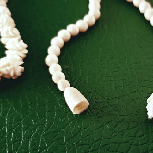 Vintage carved bone necklace with rose details