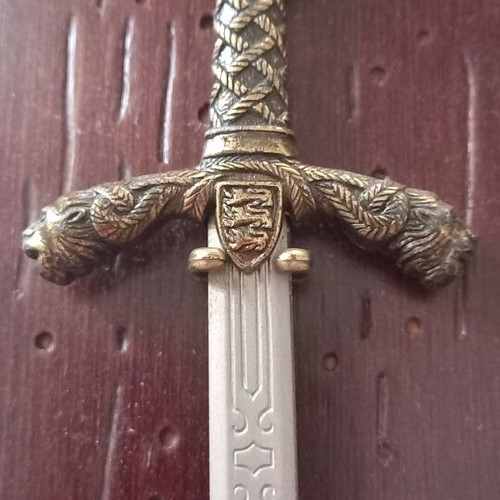 Decorative historical swords used with wooden base and metal mounts