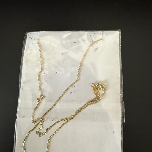 Pendant with four baby feet, gold color