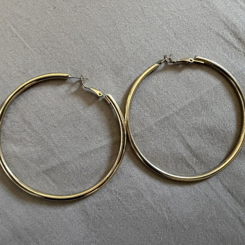 Gold color faux earrings used, slightly faded