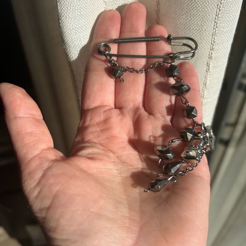 Women's pin like new, silver gunmetal brooch
