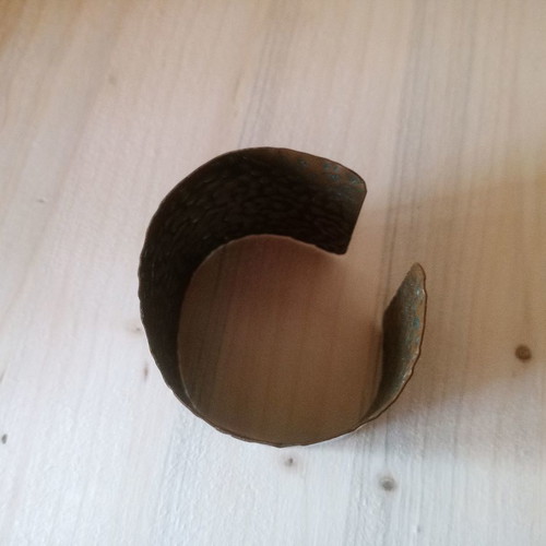Metal bracelet used with hammered design, dark silver color