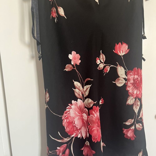 Black floral skirt with transparency medium, used